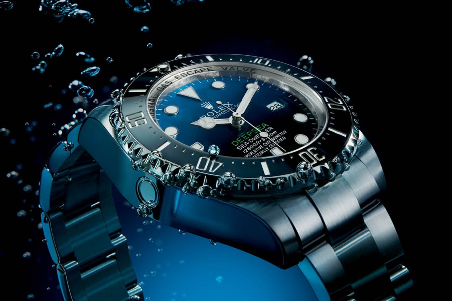 Rolex Deepsea Sea-Dweller submerged in water, showcasing the importance of pressure testing for water resistance.