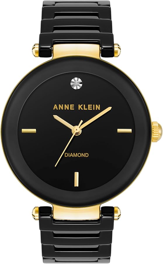 Anne Klein women’s black and gold watch with diamond detail – ideal for Anne Klein watch battery replacement services.