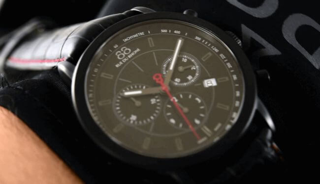 88 Rue Du Rhone watch repairs – black chronograph dial with red seconds hand on wrist