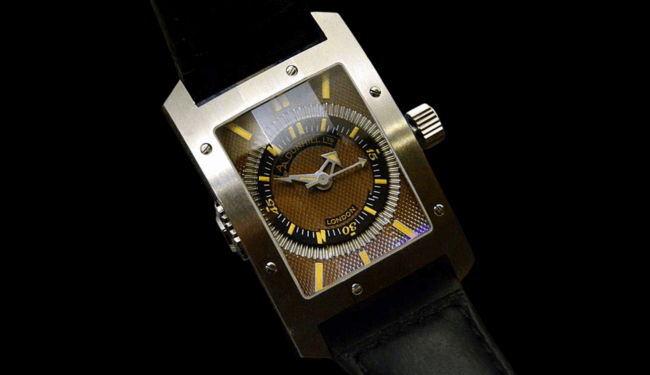 Dunhill watch with a square case and dark dial on a black leather strap against a black background