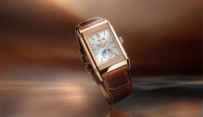 Jaeger-LeCoultre Reverso-style watch with brown leather strap on warm background – jaeger lecoultre