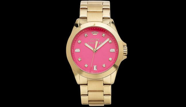 Juicy Couture gold-tone watch with pink dial on dark background – juicy couture watch repair