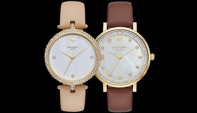 Two Kate Spade watches with white dials and leather straps on dark background – kate spade watch repair
