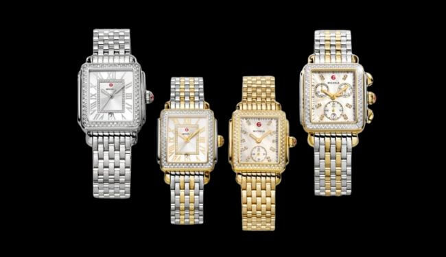 Selection of Michele-style watches in silver and gold tones on black background – michele watch repairs