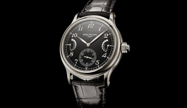 Patek Philippe watch repairs – black dial dress watch on black leather strap