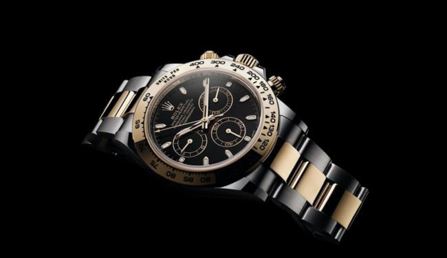 Rolex watch repairs – two-tone Rolex chronograph with black dial and metal bracelet