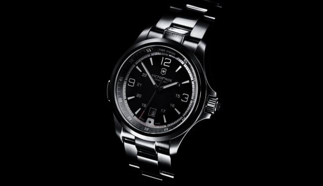 Swiss Army watch repairs – black dial Swiss Army watch with stainless steel bracelet