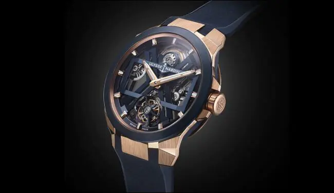 Ulysse Nardin watch with a rose-gold case, blue strap and skeleton dial on a black background