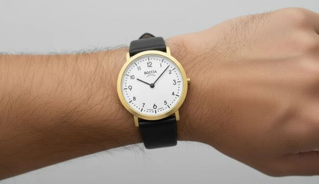 Boccia watch repairs in London – watch on wrist with black strap