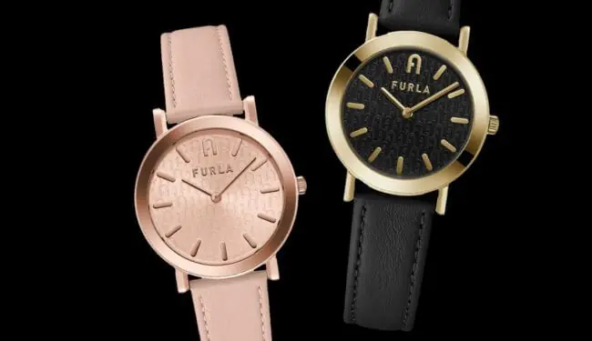Two Furla watches side by side, one with a rose gold dial and strap and one with a black dial on a black strap