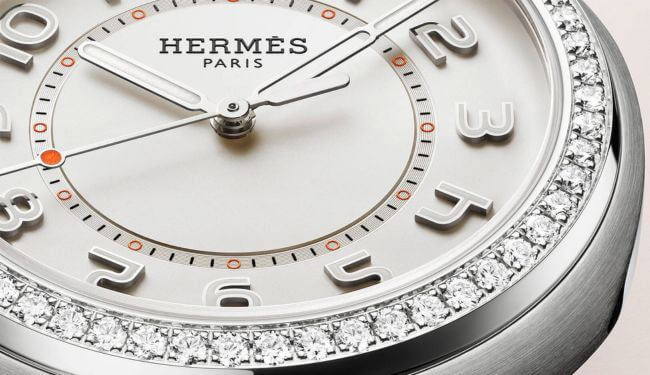 Hermes watch dial close-up with diamond bezel – Hermes watch repair