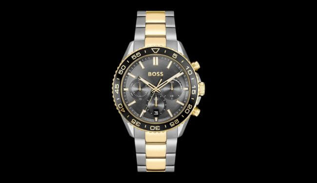 Hugo Boss watch with black dial and two-tone metal bracelet on dark background – Hugo Boss watch repair