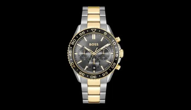 Hugo Boss watch with black dial and two-tone metal bracelet on dark background – Hugo Boss watch repair