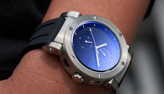 Storm watch repairs – blue dial Storm watch with stainless steel case on wrist