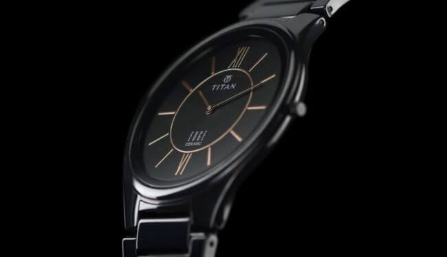 Titan watch repairs – black Titan dress watch with dark dial