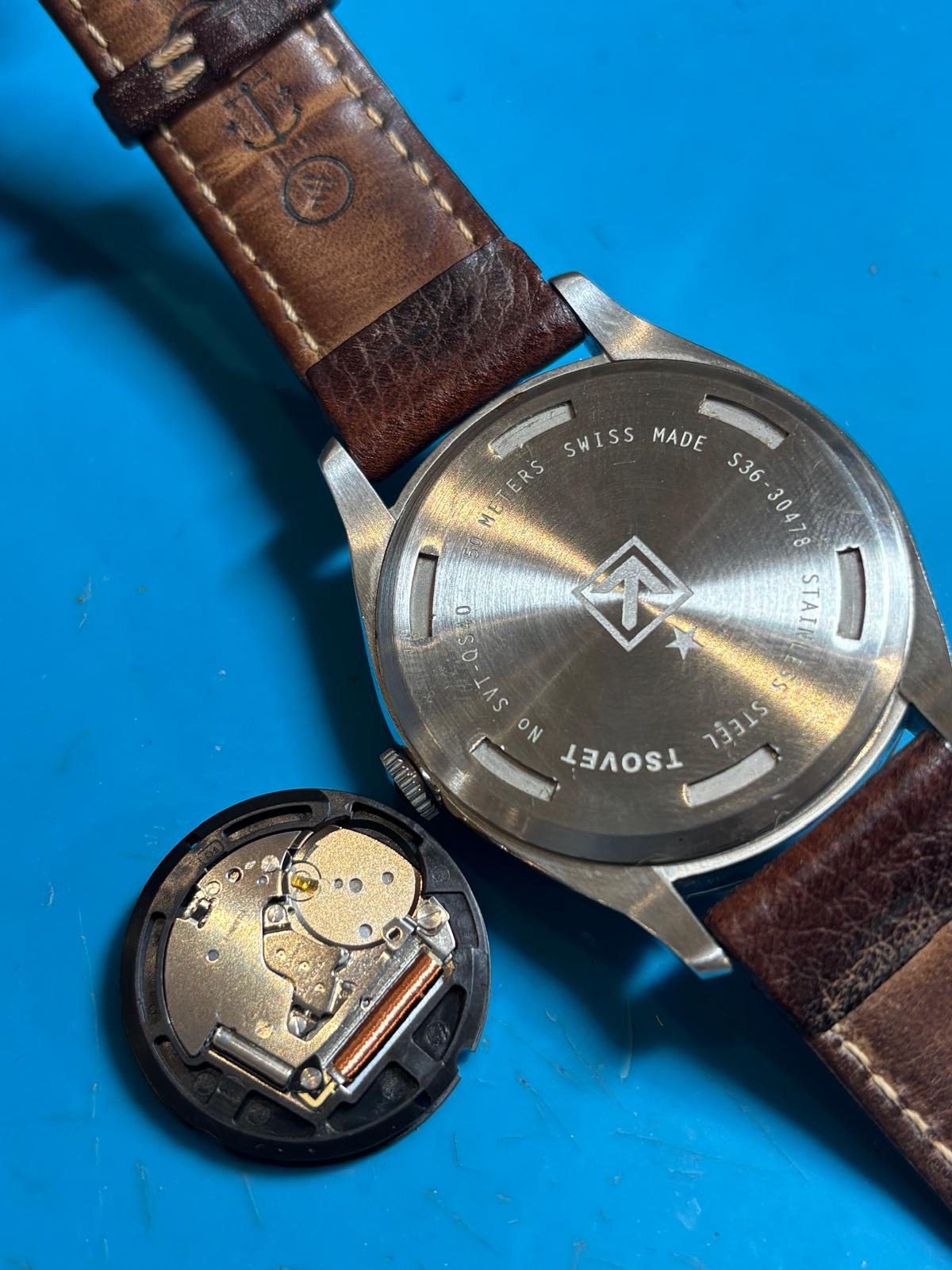 Tsovet SVT-QS40 caseback with Ronda 513 movement removed during repair