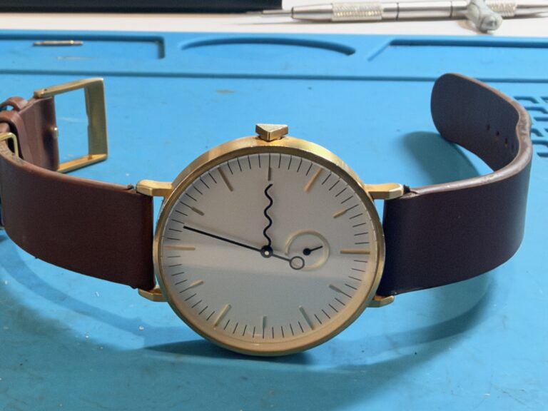 AARK watch after same-day battery replacement and reseal at Ross Watch Repairs London Bridge