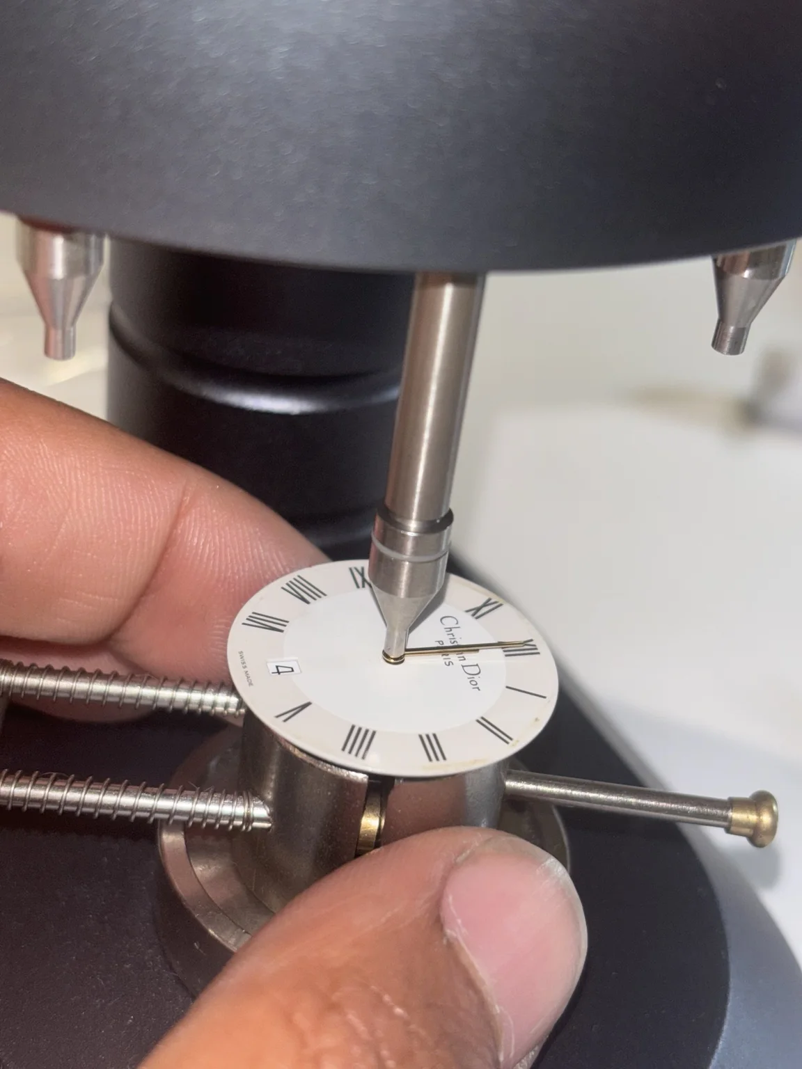 Christian Dior D45-154 hands being refitted after ETA movement replacement