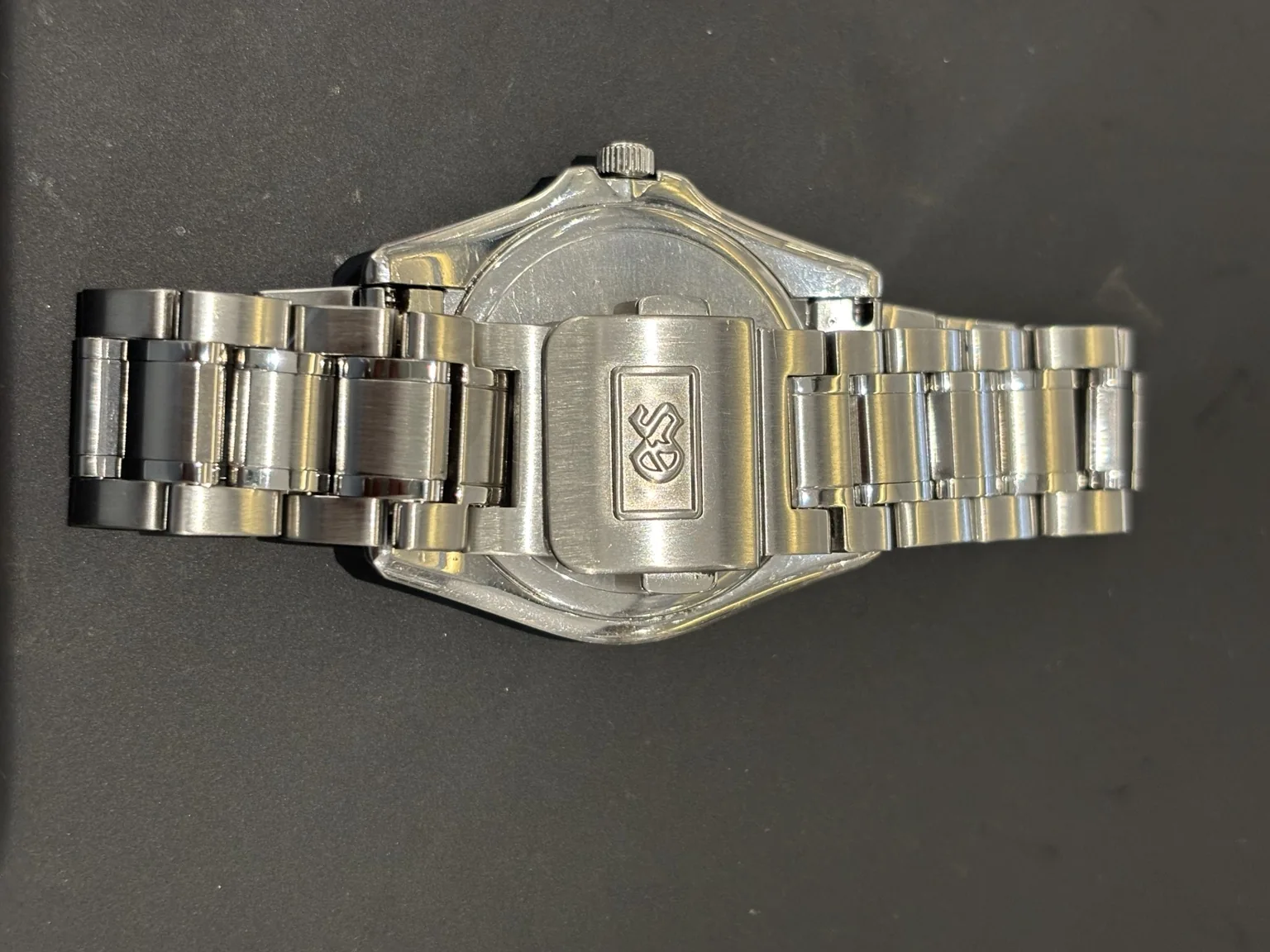 Grand Seiko signed stainless steel clasp and bracelet after the Mini Service polish