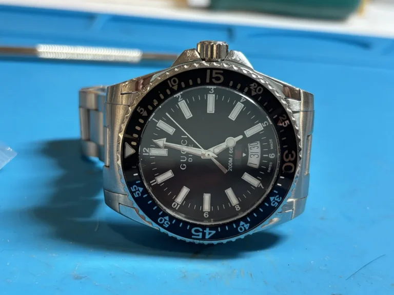 Gucci Dive 136.3 after water damage repair and polish