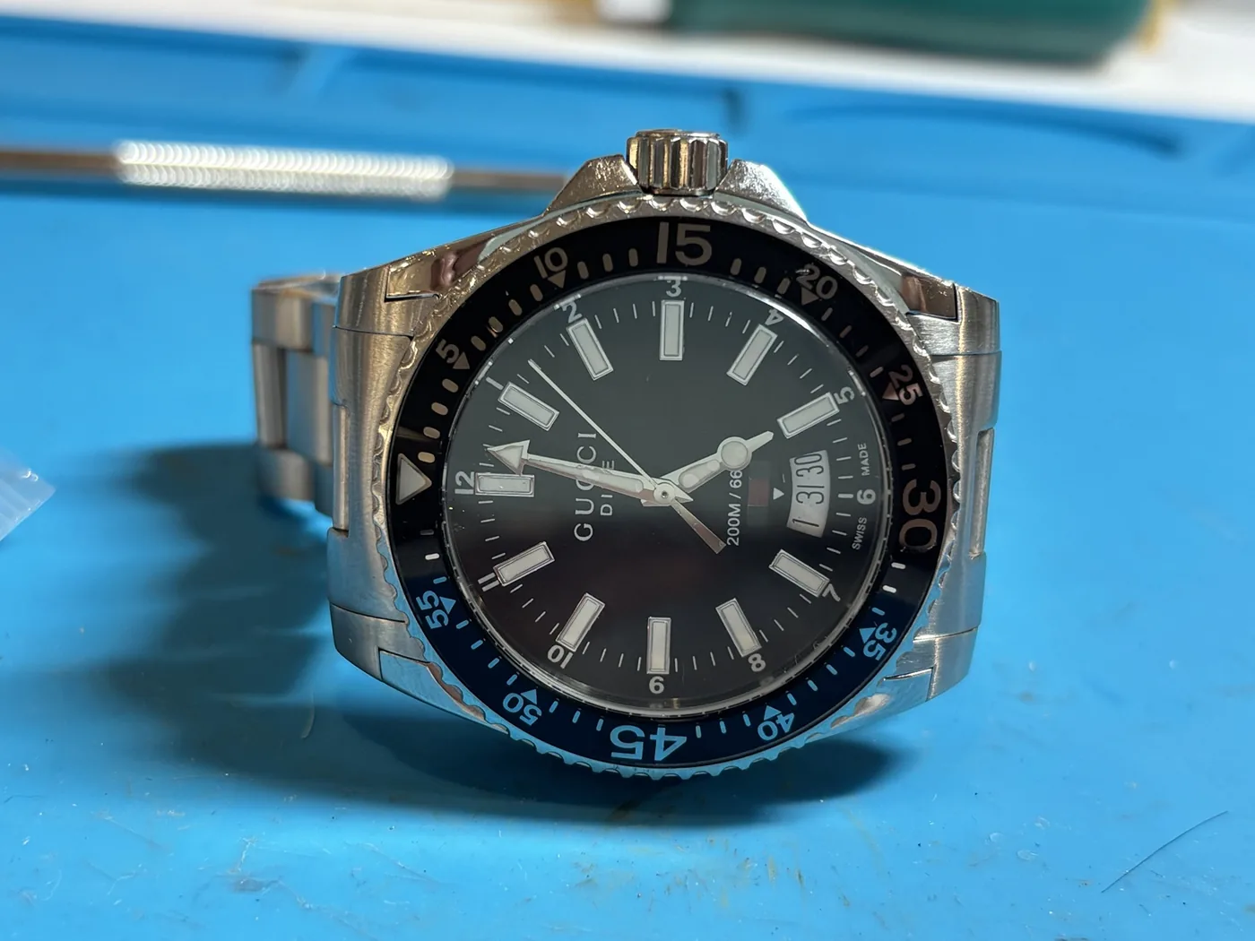 Gucci Dive 136.3 after water damage repair and polish