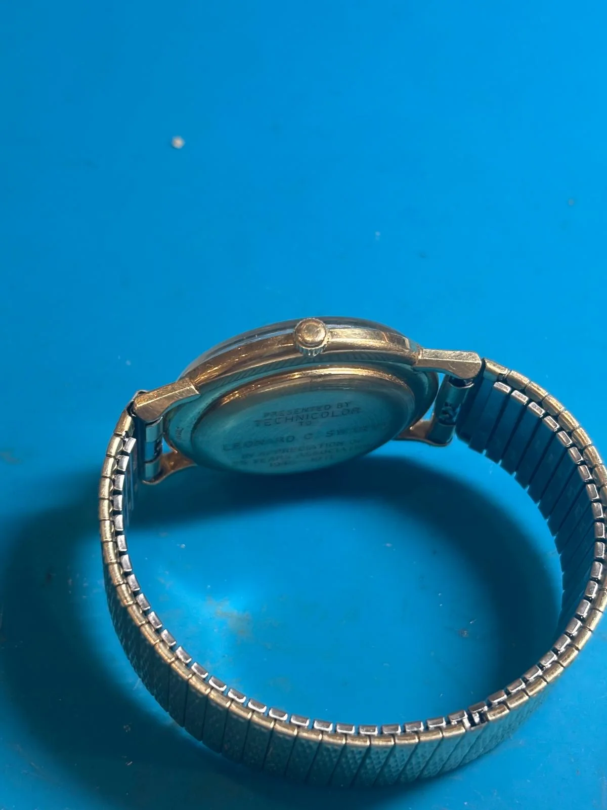 Longines Ultra-Chron caseback and bracelet during workshop inspection
