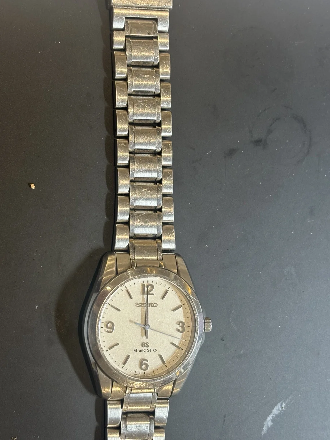 Scratches on the Grand Seiko 8J55-0010 stainless steel bracelet before polishing